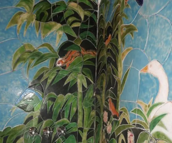 Hand-painted ceramic jungle with birds
