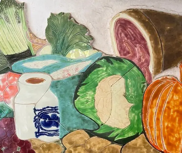 Hand-painted ceramic still life of vegetables